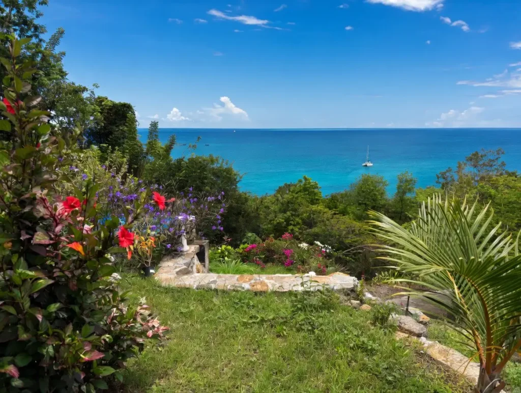 Le jardin tropical avec vue sur la mer Villa Ti'Kawet Pointe-Noire Guadeloupe